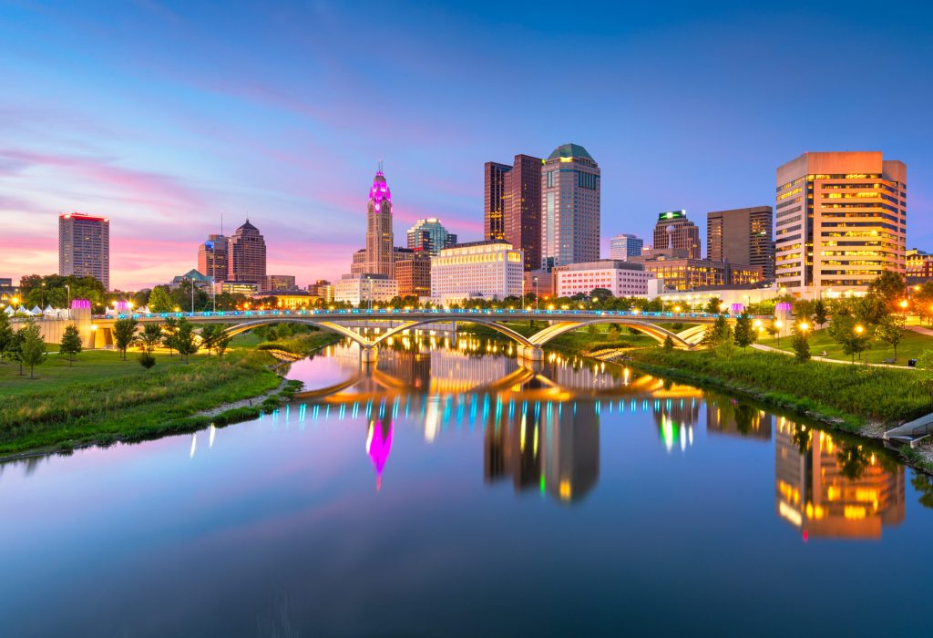 Columbus, Ohio, USA skyline on the river at dusk.